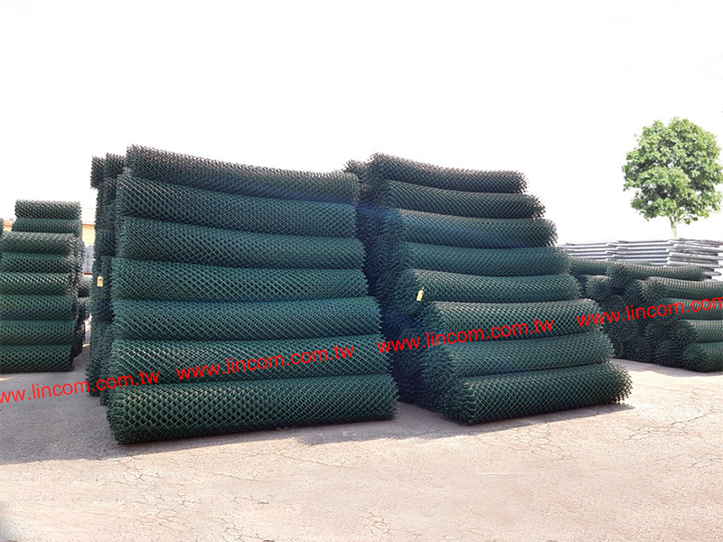 Chain link fencing in rolls.