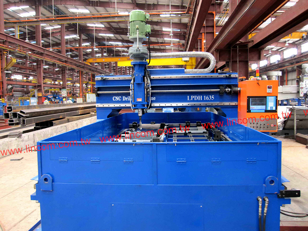 CNC plate drilling machine normal speed table type. Spindle's up-down movement by hydraulic. 