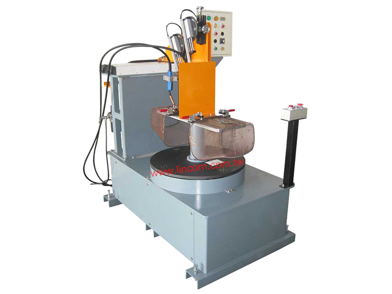Co2 auto welder, two interchange stations, twin gun type.