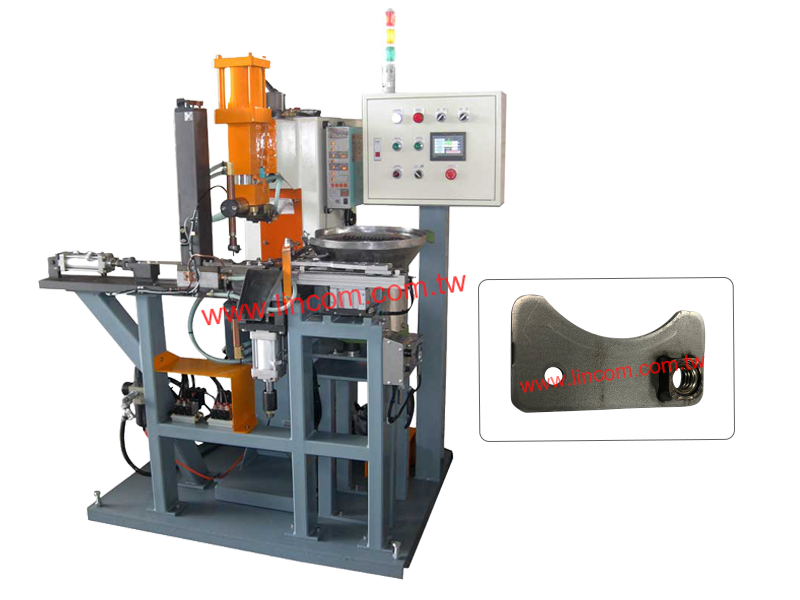 Automatic spot welder for nuts with plate.