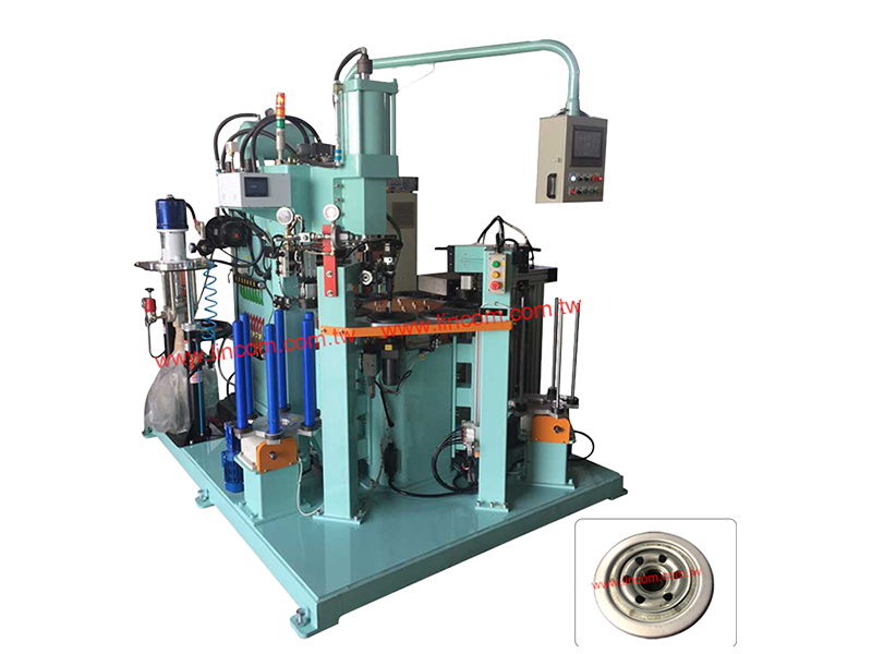 Automatic spot welder for oil filter.