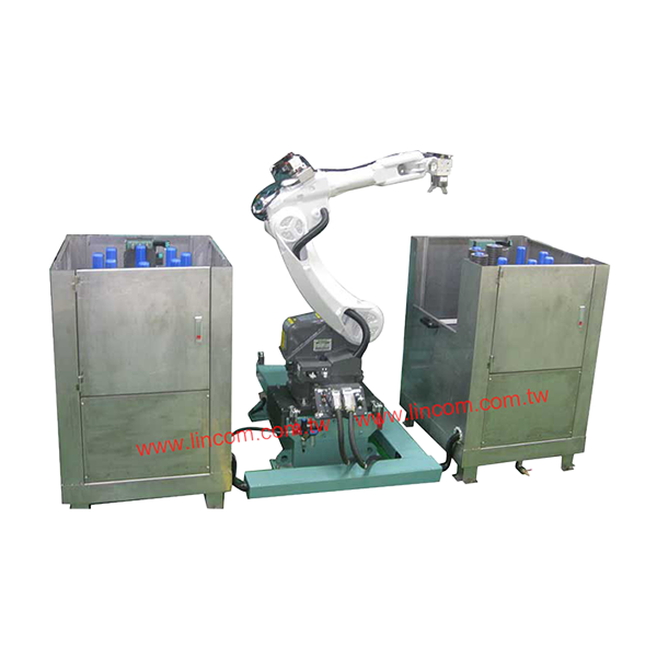 Robot arm picking abrasives.