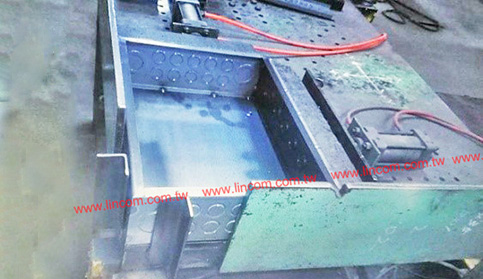 Robot welding with digital control program for fire hose cabinet manufacturing with table and fixture.