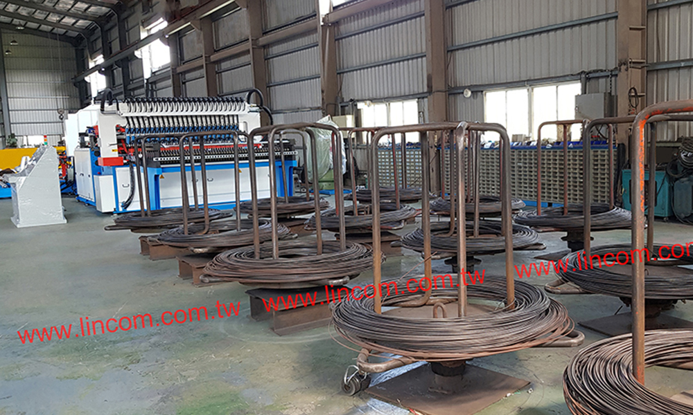 Wire coil stand for wire mesh welder wire feeding system.