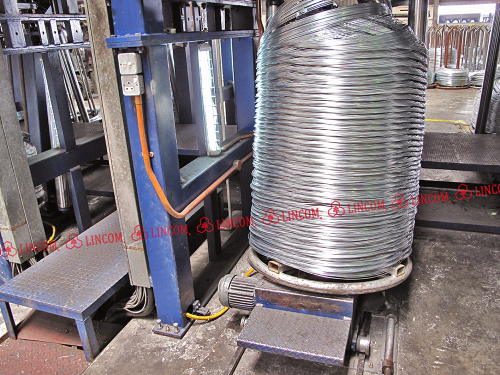 Result of zinc coating wire after tin plating surface treatment. Coil discharge. Wire hot dip galvanizing plant from Taiwan.