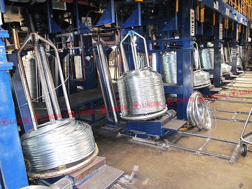 Result of zinc coating wire after tin plating surface treatment. Coil discharge. Wire hot dip galvanizing plant from Taiwan.